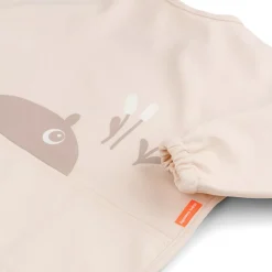 Hagesmæk med ærmer og lomme